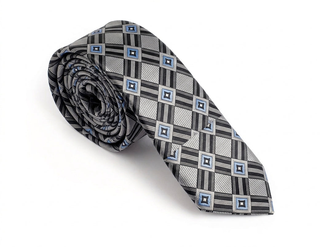 A rolled necktie featuring a geometric plaid pattern in black, gray, and light blue on a white background.