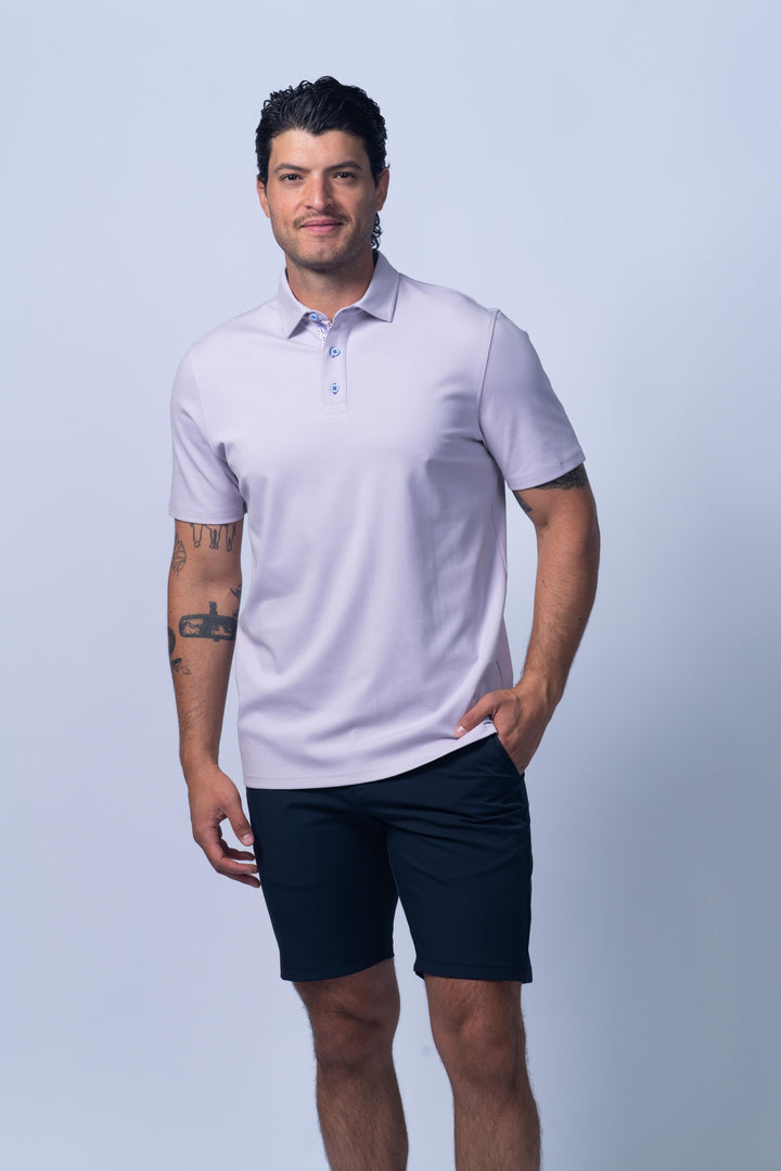 Man wearing a light purple polo shirt