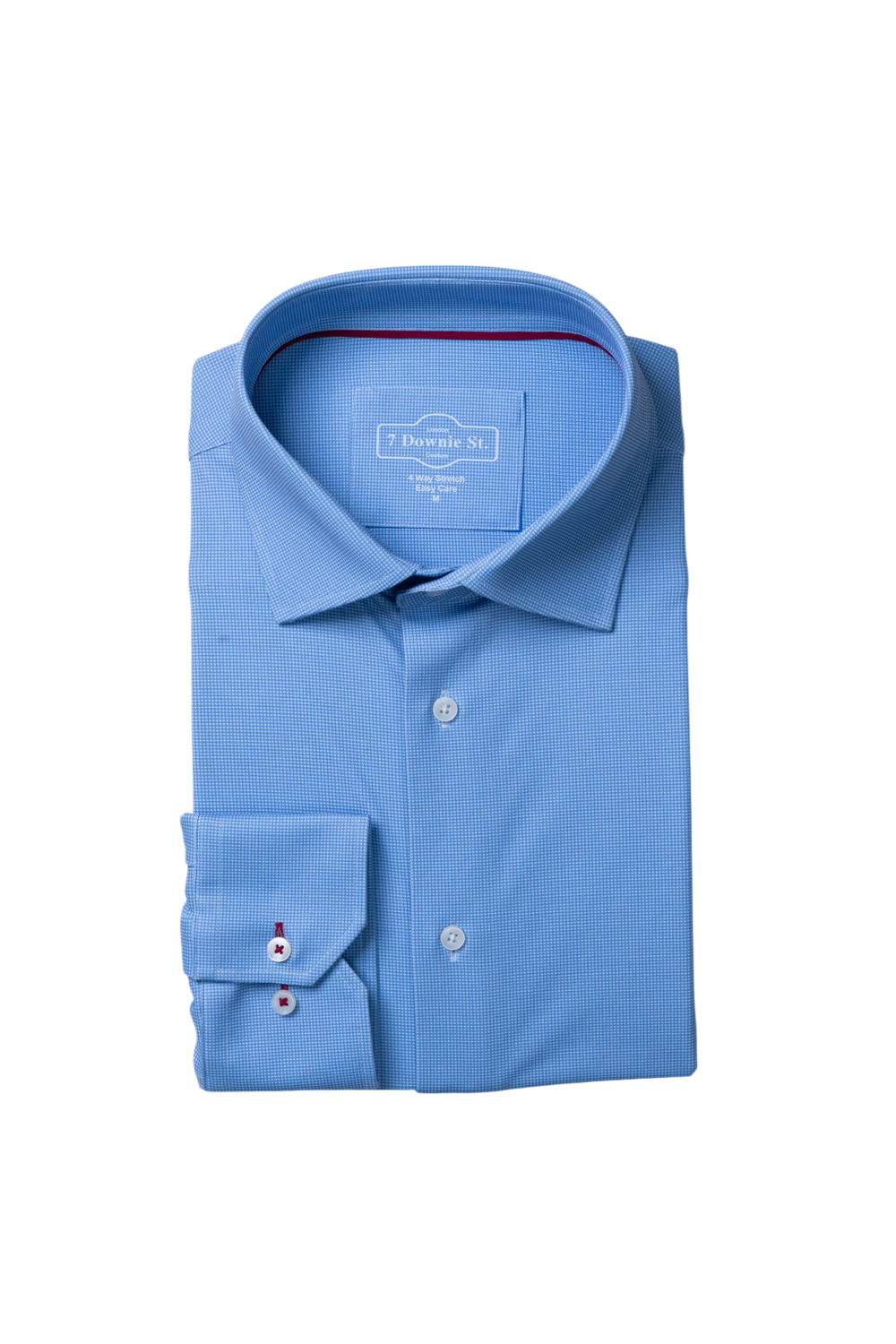 Light blue folded SilkTouch Knit Shirt with standard collar and button closure, showcasing a relaxed fit.