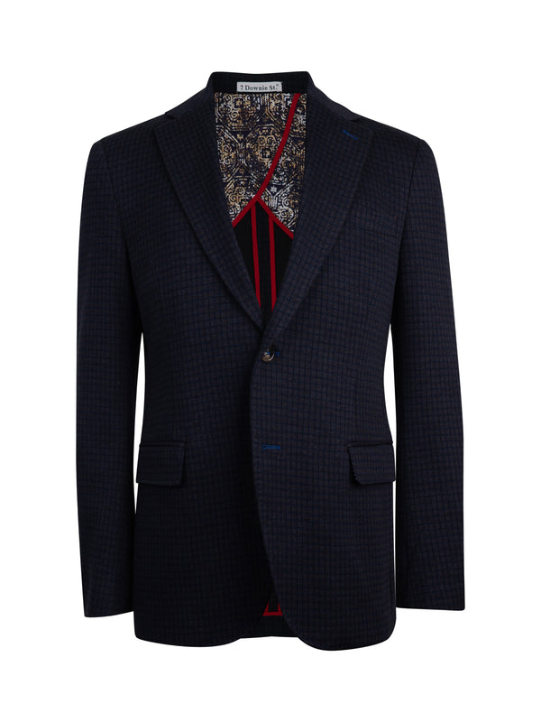 A dark navy blue houndstooth blazer with a patterned lining and red striped inner collar, displayed on a white background.