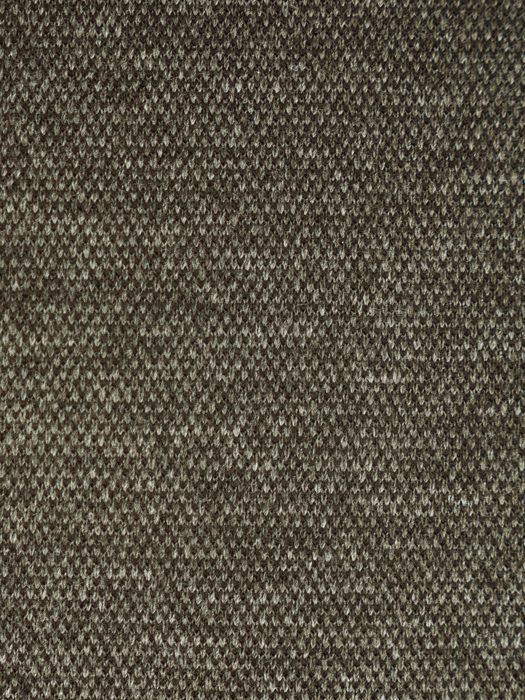A close-up texture shot of a woven fabric with a fine, ribbed pattern in a heathered brown and beige colorway.