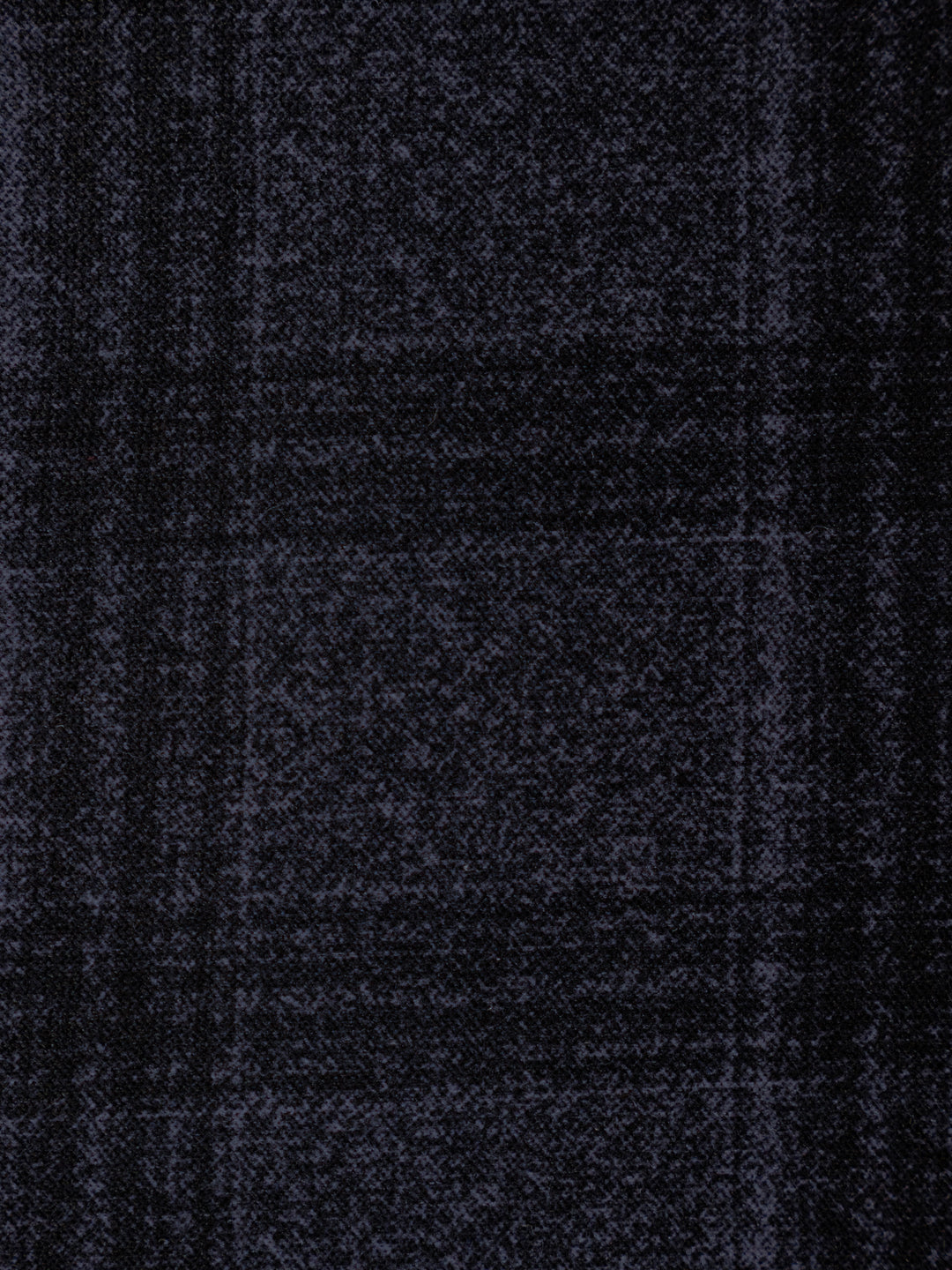 A close-up of a dark navy blue textured fabric with a subtle plaid pattern.