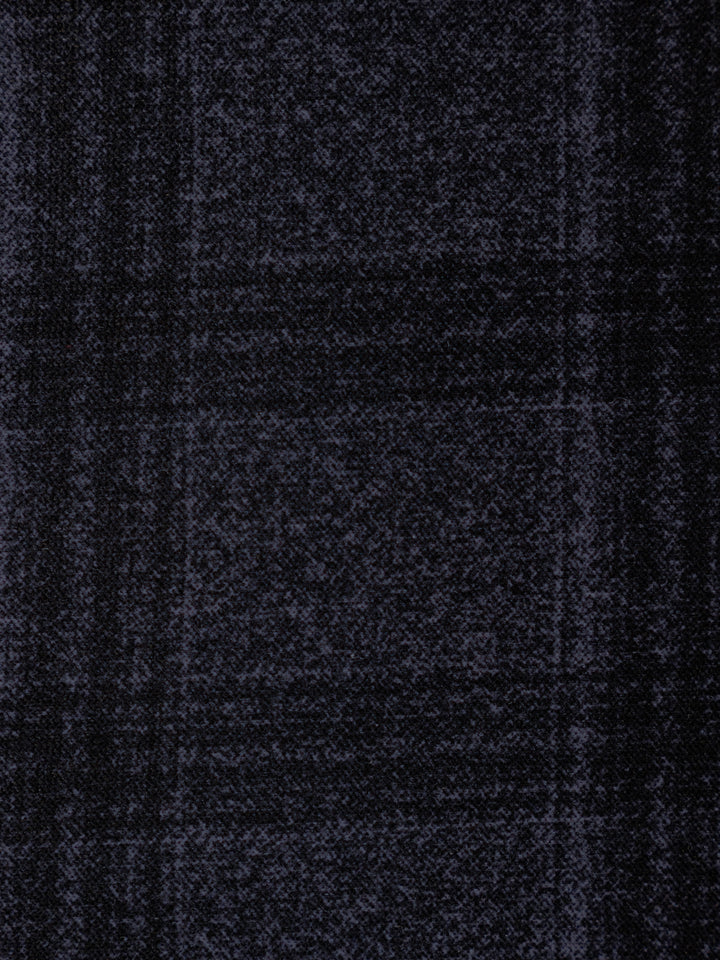 A close-up of a dark navy blue textured fabric with a subtle plaid pattern.