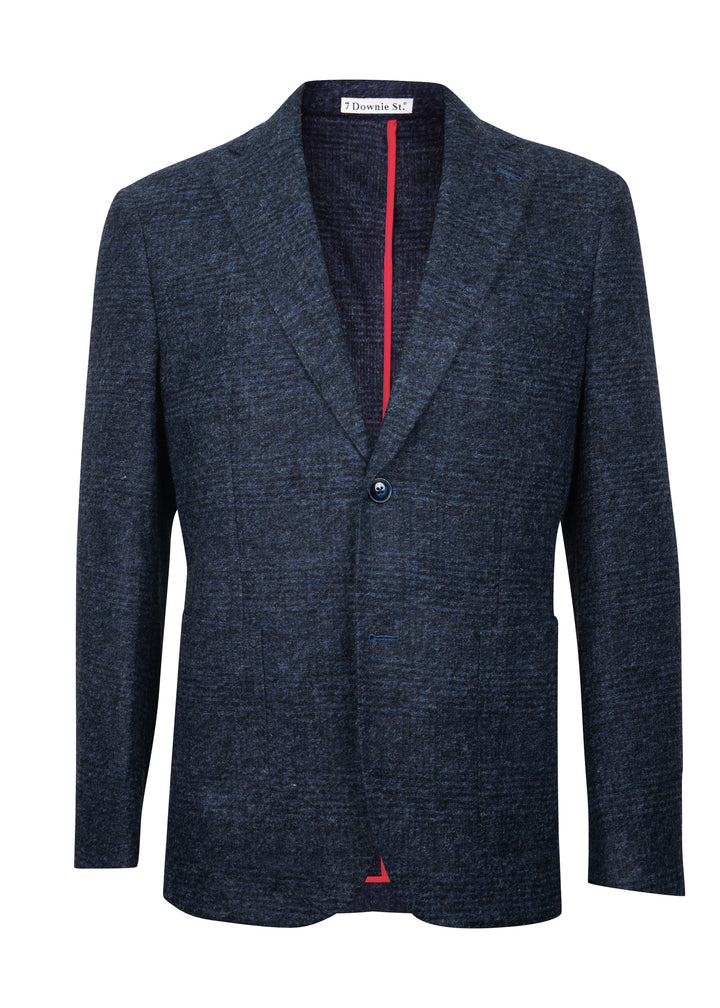 A dark navy blue textured blazer with a subtle houndstooth pattern, featuring a single button closure and a vibrant red inner lining visible at the collar and hem.
