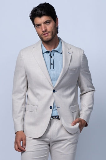 Tan twill stretch blazer with notch lapel, button closure, and two front pockets, styled with a light blue polo shirt.